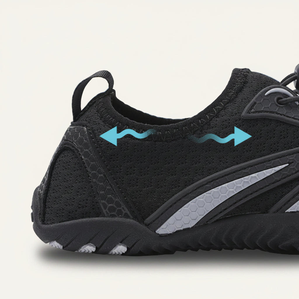 HydroFlex barfota vattenskor vuxna svart – närbild sida med vattenavledande pilar och snabbtorkande material | footflow